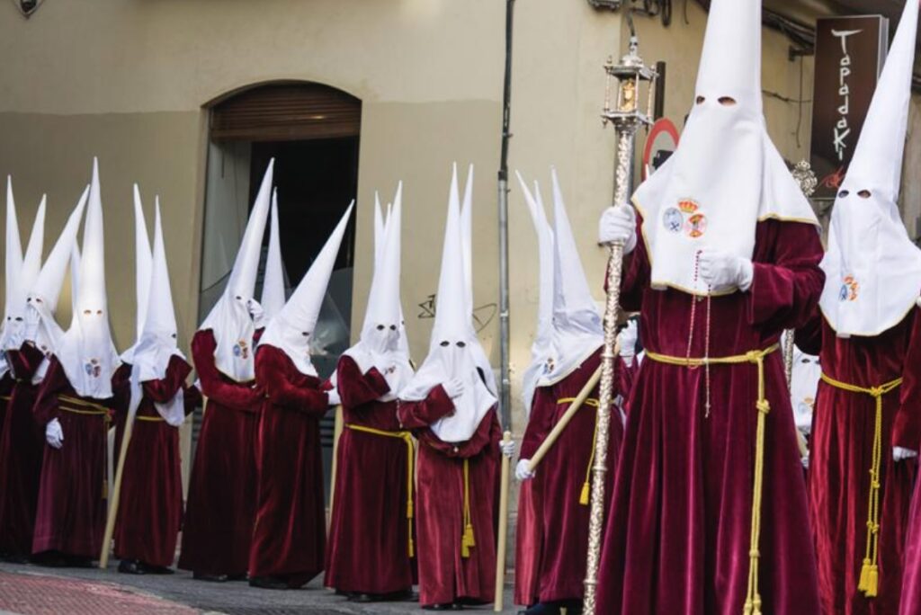The Spanish Easter parades pointy hats are unlike the KKKs in America